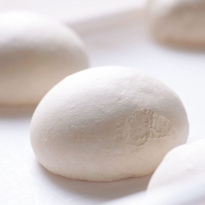Lipoxygenase is an enzyme used in commercial food production to help with dough handling.