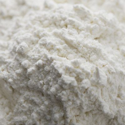 Flour, a fine powder made by grinding wheat kernels, is the main component of most baked goods.