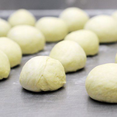 L-cysteine is used in baking to reduce mix times and create a more extensible bread dough.