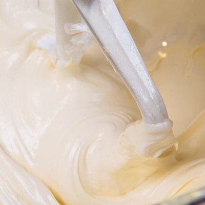 Acetylated Monoglycerides (AMG) is an emulsifying ingredient in cake batter and frosting.