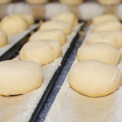 Mono and diglycerides replacement means the the substitution of traditional emulsifiers in dough.