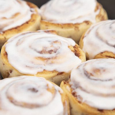 A cinnamon roll is a sweet baked dough filled with a cinnamon-sugar filling.