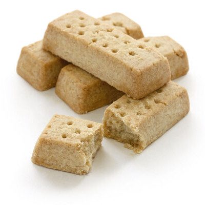 Shortbread is a traditional Scotish cookie (biscuit, in British English) characterized by a crumbly texture and made with butter, sugar, and oat or wheat flour.