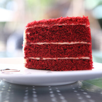 Red velvet cake is a delicious cake often covered with sweet cream cheese frosting.