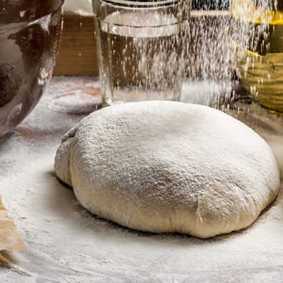 Damaged starch is used in baking to increase water absorption and provide extra nutrition for the yeast.
